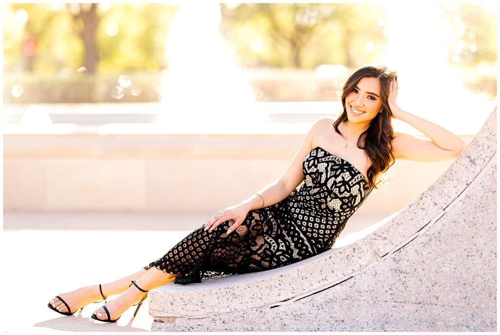Texas Tech senior poses on the seal